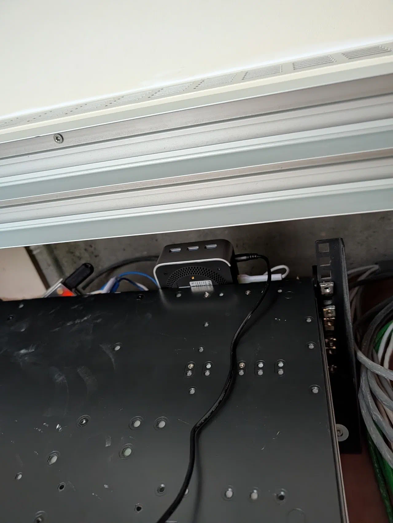 Backside of server case under a cabinet