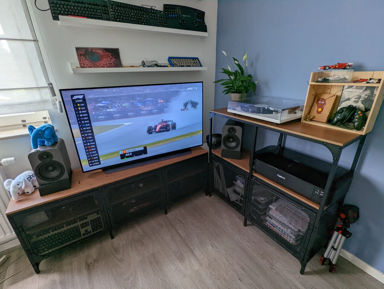 A TV showing a Formula 1 race